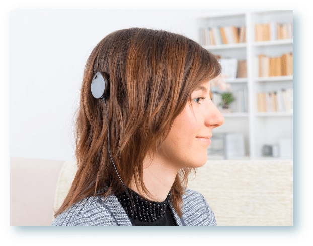 patient with severe hearing loss wearing cochlear implants